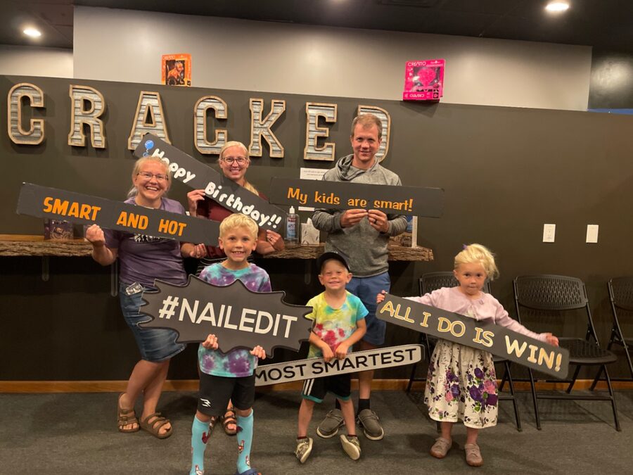 Birthday group with victory signs in the Cracked lobby